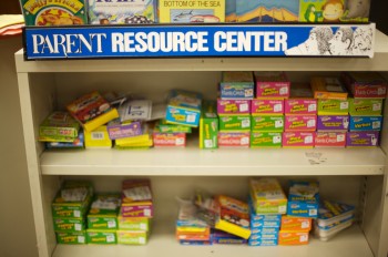 Parent Resource Center sign over shelves containing learning materials