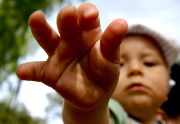 child reaching